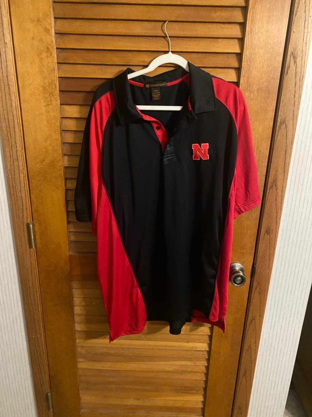 Nebraska Black and Red Short-Sleeve Performance Polo